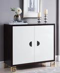 White cabinet with Four Pack Half Moon Cabinet Pulls 2.5 Inch Semicircle Drawer Handles installed, featuring minimalist decor.