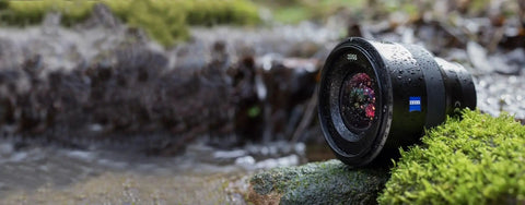 Batis 18mm F/2.8 Wide Angle Lens For Sony E Mount Full-Frame Cameras, weatherproof on moss beside stream