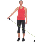 Woman using Stellar Resistance Band Wall Anchor Kit For Home Gym And Physical Therapy with green resistance band.