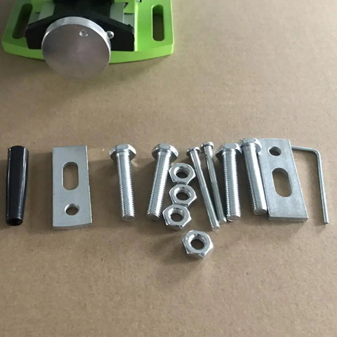 Portable Milling Machine Work Table Vise components and clamps on a beige surface
