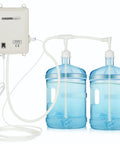 5 Gallon Water Dispenser Pump set up with two blue water jugs and a plug and play automatic pump system.