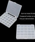 Clear plastic bobbin organizer box with 25 compartments for sewing machine bobbins, lid open view