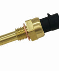 Close-up of brass engine coolant temperature sensor with threaded probe and black plastic connector