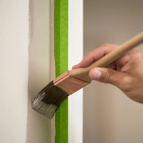 Multi Surface Painter's Tape With PaintBlock Technology Pro Grade 1 Inch Wide 0.94 In By 60 Yds Green Medium Adhesion in use on wall