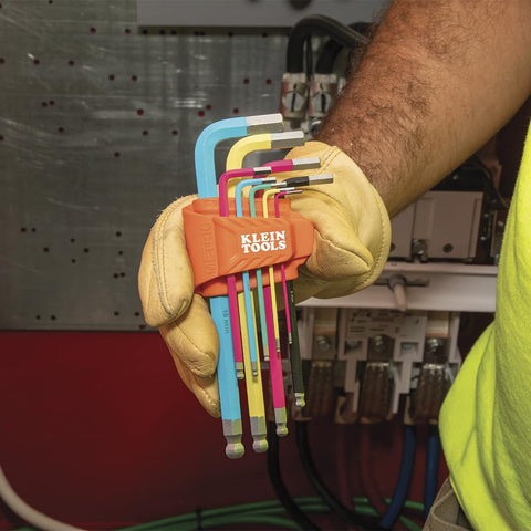 Long Ball End Hex Key Wrench Set With SAE And Metric held by gloved hand, colorful powder coat, easy size ID