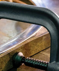 Close-up of Beefy Heavy Duty C Clamp With Twelve And A Quarter Inch Opening And Six And A Quarter Inch Throat Providing 9300 Lb Clamping Force Model 412 in use.