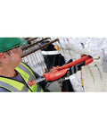 Worker using HY 200-R Injectable Mortar Two-Pack for Fast-Setting Concrete and Masonry Repairs on a wall crack.