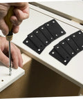 Heavy Duty Stainless Steel Corner Braces Rock Solid Wood Joint Connectors being installed with a screwdriver on cabinet edge.