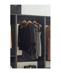 Freestanding Gray Wood Closet System With Five Modular Wardrobe Units For No Stress Setup Clean Vibes showing hanging dresses.