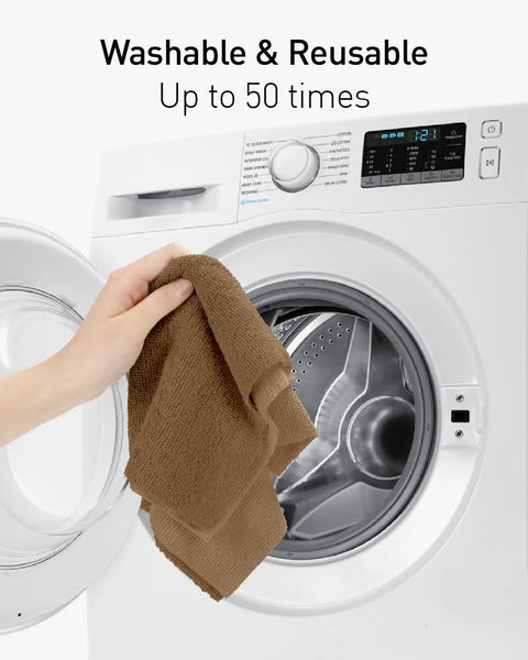 Front view: Fantasticlean tan microfiber cleaning cloth held in hand near open washing machine.