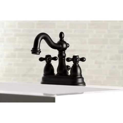 Heritage Matte Black Four Inch Centerset Bathroom Faucet Built To Last With Solid Brass Build, Duraseal Washerless Cartridge on sink