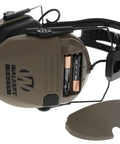 Side view of Razor Tacti-Grip Earmuffs showing battery compartment, flat dark earth finish, slip-free silicone headband.