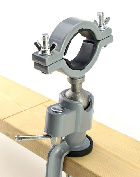 Sturdy Aluminum Alloy Bench Vise Clamp With Breezy 360 Spin And Quick 45 Degree Tilt, close-up of locking mechanism on wood.