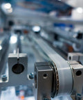 Close-up of 4 Pack SK25 Aluminum Linear Rod Rail Shaft Support Brackets for 25mm Shaft in industrial automation setup
