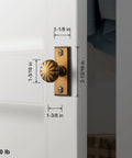 Top Notch Antique Brass Cabinet Knobs With Backplate Offering A Real Deal Plaquette Style For Drawers And Cupboards Pack Of Six Sturdy Kitchen Furniture Handles Delivering Serious Old Soul Charm mounted on a white cabinet door, showcasing measurements.