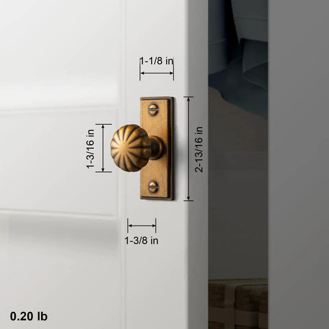 Top Notch Antique Brass Cabinet Knobs With Backplate Offering A Real Deal Plaquette Style For Drawers And Cupboards Pack Of Six Sturdy Kitchen Furniture Handles Delivering Serious Old Soul Charm mounted on a white cabinet door, showcasing measurements.