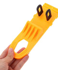 Professional Grade Paintless Dent Removal Kit Featuring Sturdy Pullers And Strong Glue Tabs To Knock Out Dinged Up Bumpers Fenders And Hoods Restore Your Banged Up Ride Clean Now, yellow puller in hand.