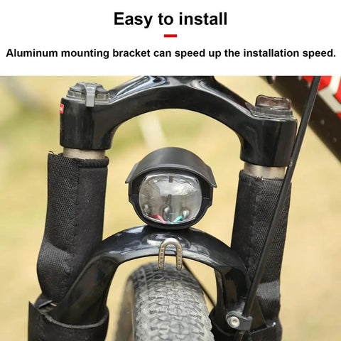 Dual Function 12W E Bike Front Headlight With Built In Horn mounted on bicycle fork close-up