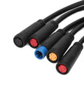 Close-up of durable waterproof electric bike connector cables with color-coded plugs for mods and custom builds, ABS construction.