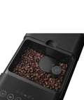 No Sweat Brewing Fully Automatic Espresso Machine With Integrated Grinder displaying coffee beans in matte black container.