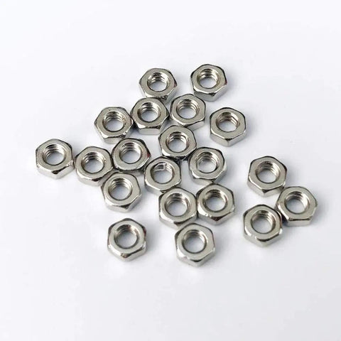Premium Brass Male Female Hex Standoff Spacers For Motherboard Hardware And Circuit Board Mounting Solid Copper Alloy nuts laid out on a white surface.
