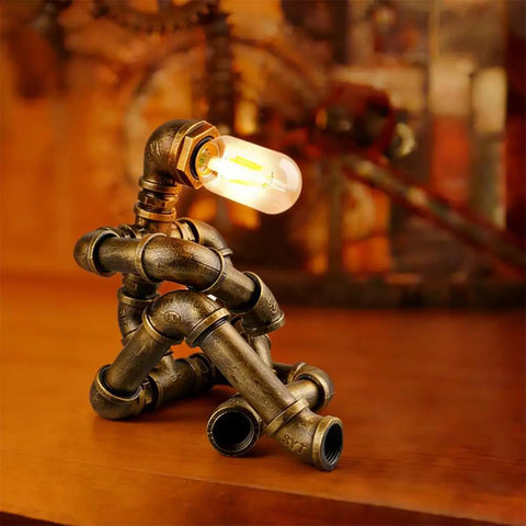 Steampunk Robot Table Lamp With Vintage Industrial Water Pipe Design for Bedside Nightstand, rustic bronze robot silhouette