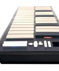 Malletstation EM Pro 2.0 Octave Control Module for Mallet Players with removable gap caps in charcoal finish, side view