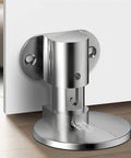 Invisible Metal Magnetic Door Catch Stops Keep Doors From Slamming Shut With Strong Hold For Bedrooms Bathrooms Offices And Homes In Cool Black Finish close-up of sleek metal latch on wall