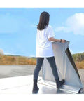 Person using Pro Level Self Adhesive Aluminum Foil Roof Flashing Tape Heavy Duty Butyl Waterproofing Underlayment Roll.
