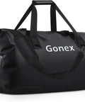 Extra Large Waterproof Duffel Bag 80L With Roll Top Closure And PVC Build in black, showing side handle and strap
