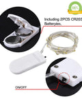 Battery Operated Fairy Lights Six Pack No Remote Waterproof Firefly String Lights showing battery compartment and switch.