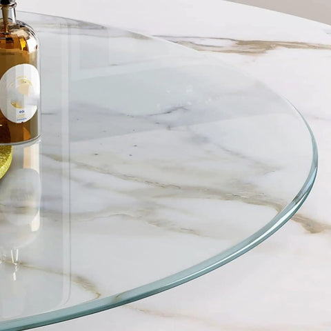 Clear tempered glass lazy susan on marble counter showcasing Smooth 360 Degree Lazy Susan Turntable Tray Made From Clear Tempered Glass Heavy Duty Serving Plate For Kitchen Dining Rotates Quietly On Any Table And Ideal For Meals, Entertaining, And Home Decor.