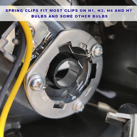 Close-up of stainless steel bulb retaining spring clip for headlights, fitting H1 H3 H4 H7 bulbs, universal use in most vehicles.
