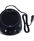 Fast Heating Electric Mug Warmer Featuring Four Adjustable Heat Settings And Smart Auto Shutoff with black surface and controls.