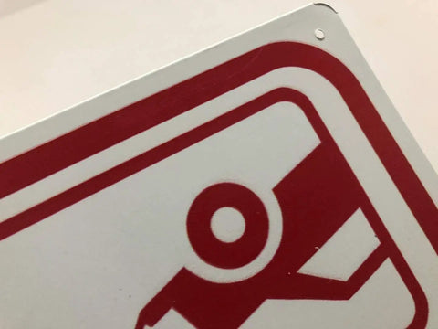 Close-up of the Heads Up Aluminum Security Camera And Audio Recording Sign Durable Metal Wall Plaque For Home Base Or Business Shop Sharp Surveillance Decal.