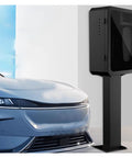 Keep It Square Heavy Duty EV Charger Station Protector All Weatherproof Electrical Enclosure mounted beside electric vehicle.