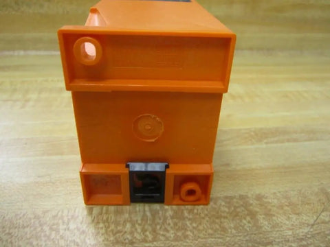 Dn001 Power Supply Switching Amplifier 110 V AC Netzteil Module For Industrial Automation, Used Good Condition, Dn0012 Pro Grade Controller For PLC Systems And Sensors, Heavy Duty Build, Ready To Install. Orange plastic 110V AC module, 3 x 3 x 5 in, front view.