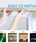 Installing Rainbow RGB LED Strip Lights Kit 32.8ft 12V Waterproof Neon Pixel with Remote Controller on a wooden shelf.