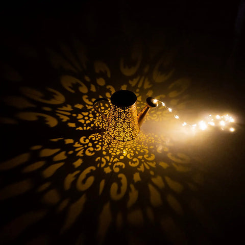 Solar Watering Can Lights Outdoor Garden Decor Large Waterproof Cascading LED Hanging Lights With Copper Wire casting shadows