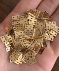 1:12 Scale Miniature Door Hinges With Screws, Set Of 4 For Dollhouse Doors And Cabinets, held in a hand to show scale