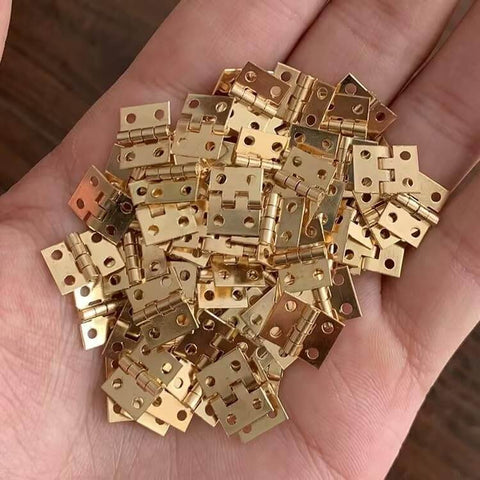 1:12 Scale Miniature Door Hinges With Screws, Set Of 4 For Dollhouse Doors And Cabinets, held in a hand to show scale