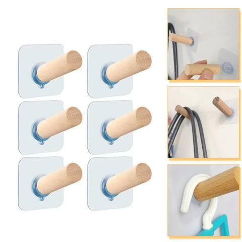 6 Piece Extra Long Wooden Wall Hooks Self Adhesive Coat Rack For Doors Easy Peel Stick, showcasing the wooden pegs mounted on surfaces.