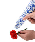Person using Dope Resin Heat Gun 300W With 6.6Ft Cable For Crafts And DIY Projects on a red rose, featuring floral patterned handle