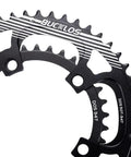 Close-up of 110 BCD Aluminum Bike Chainring Set With Pin 5 Bolt Double Round For Road Bikes, detail of teeth and bolt holes.