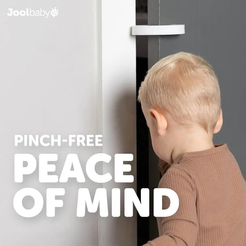 Child interacting with a door fitted with Snaps Right On Eva Foam Door Pinch Guards And Slam Blockers for safety.