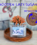 13.38 Inch Round Solid Wood Lazy Susan Turntable Tray holding flowers and a photo, showcasing smooth swivel base for cabinets and pantries.