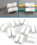 100Pcs Quick Wire Connectors Set, 2 Pin Push In Wire Terminals, 5A 220V White Plastic Shell shown unused and with wires