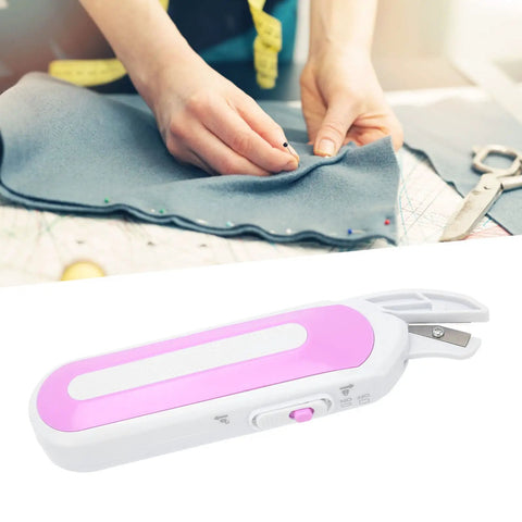 Top Notch Cordless Electric Scissors For Cutting Fabric Carpet And Rubber With Ergonomic Grip And Dual Power Modes To Handle Every Craft Job Without Breaking A Sweat, shown with fabric and pins.