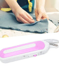 Cordless Electric Scissors Rechargeable Power Shears Slice Through Fabric Cardboard And Paper Like Butter Ergonomic Design with sharp blades on a table.