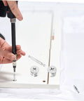 Person assembling furniture with 20 Sets Cam Fittings Kit For Furniture Connectors With Dowels And Fasteners For Cabinet Assembly